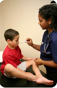 Doctor taking a child